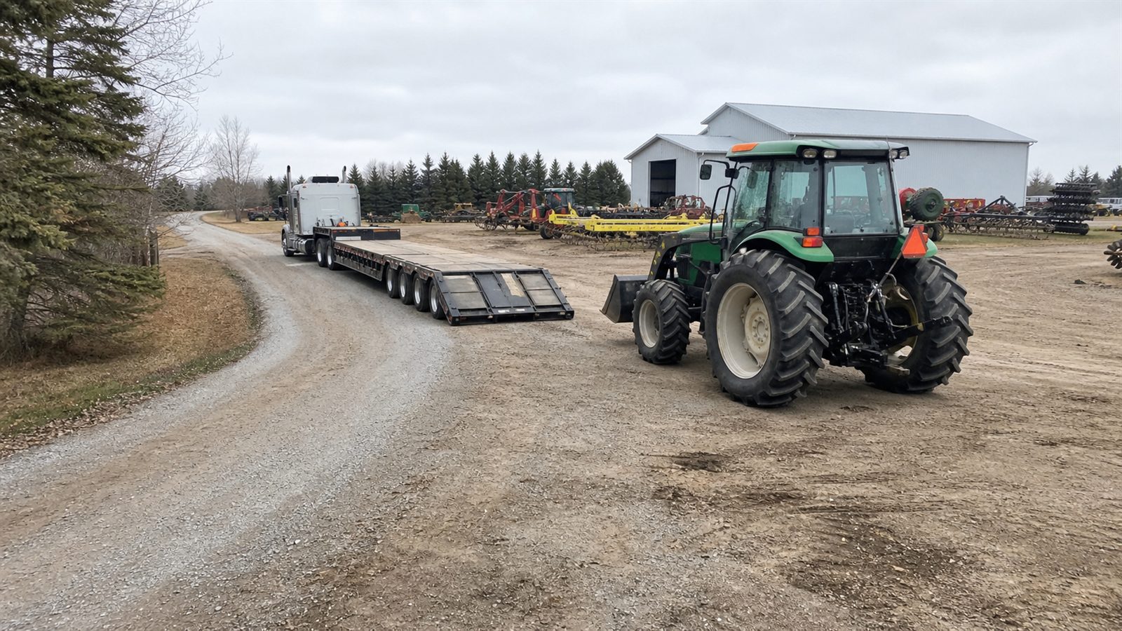 Tires, width, and implements matter for equipment hauling transport planning.